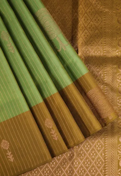 Olive Green Soft Silk Saree with Copper Zari Straipes And Puttas