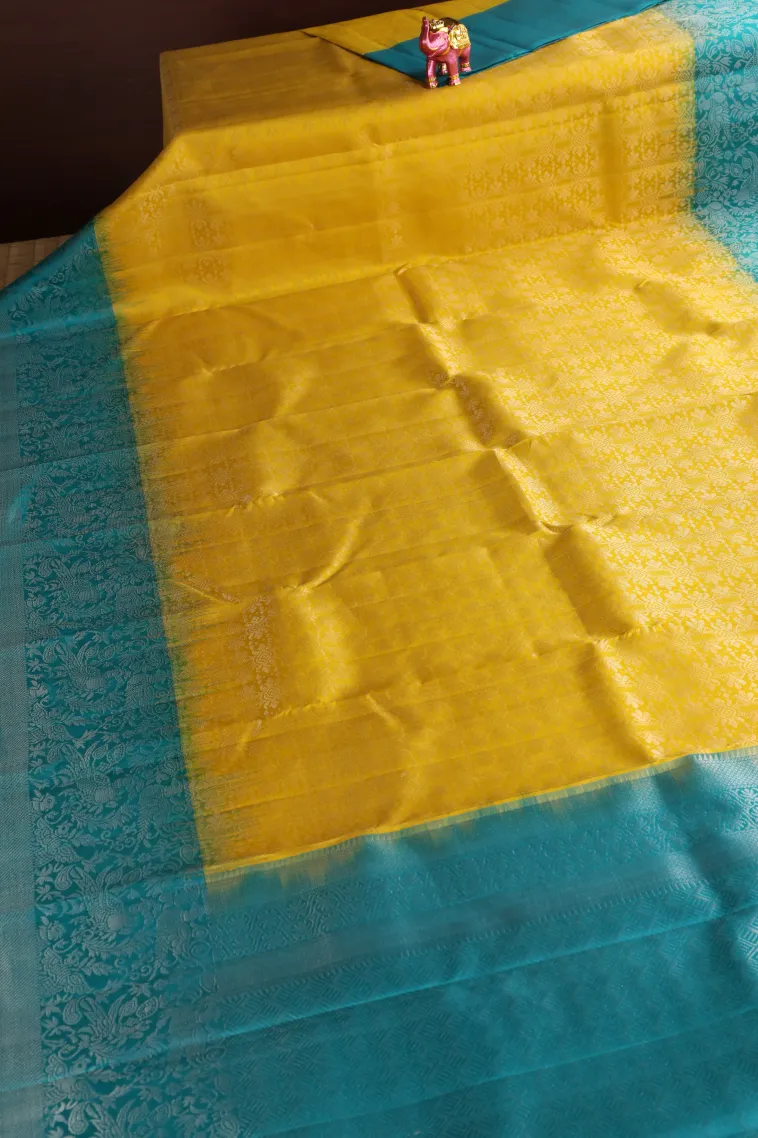 Macaroon Yellow Soft Silk Saree with Silver Zari Floral Patterns view 2