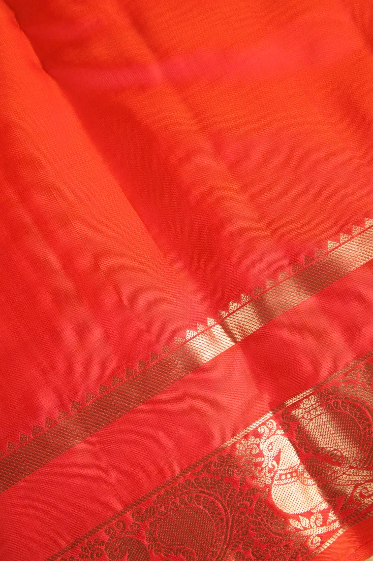 Fire Orange Soft Silk Saree with Gold Zari Peacock Motifs view 3