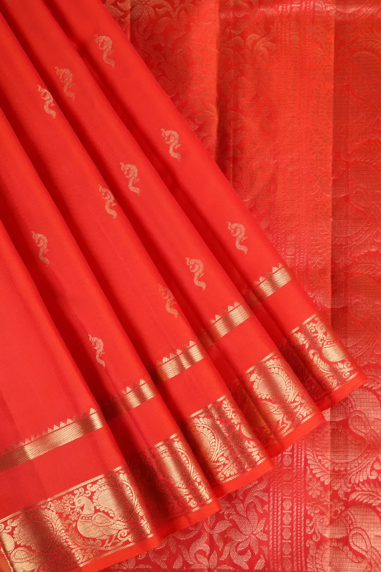 Fire Orange Soft Silk Saree with Gold Zari Peacock Motifs