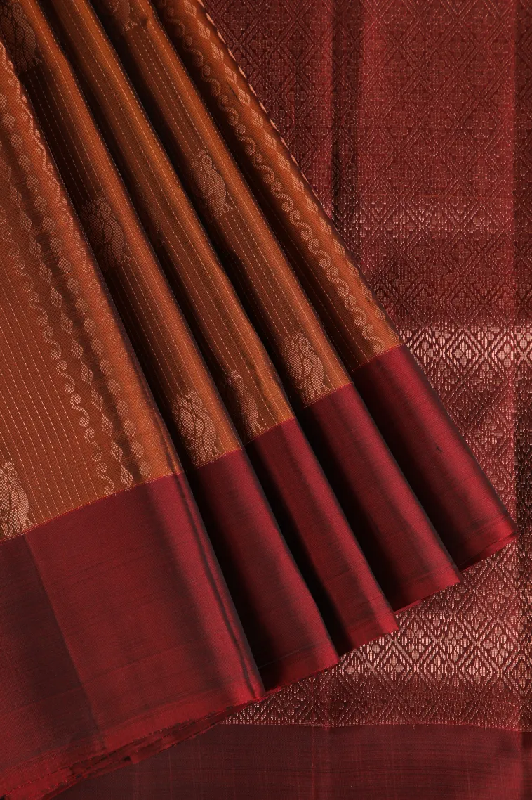 Tawny Brown Soft Silk Saree with Copper Zari Straipes And Puttas
