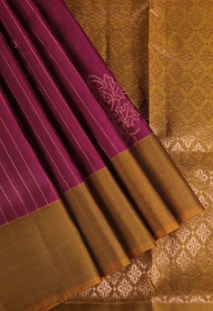 Magenta Purple Soft Silk Saree with Copper Zari Straipes And Puttas