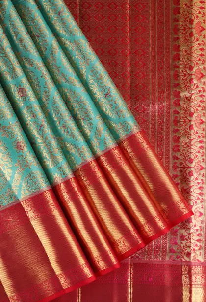 Teal Blue Kanchipuram Silk Sarees with Gold Zari Floral Patterns