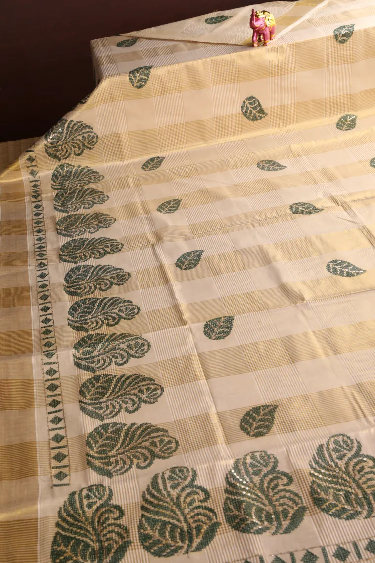 Cream White Kasavu Sarees with Gold Zari Checks And Puttas view 2