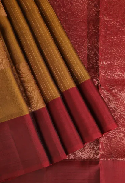 Gold Soft Silk Saree with Copper Zari Straipes And Puttas