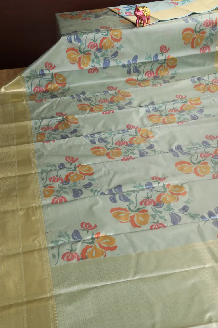 Pistachio Green Soft Silk Sarees with Bronze Zari Floral Patterns view 2