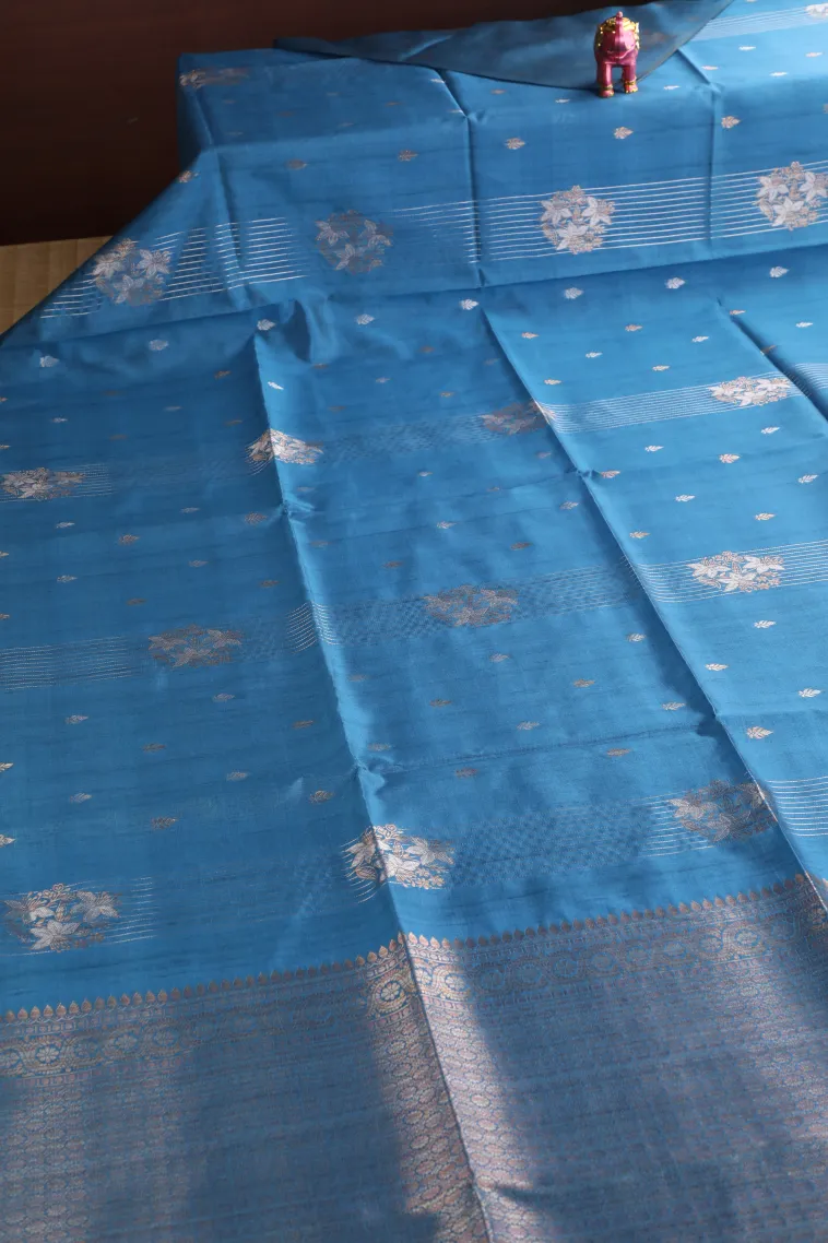 Cerulean Blue Tussar Saree with Copper And Silver Zari Stripes And Puttas view 2