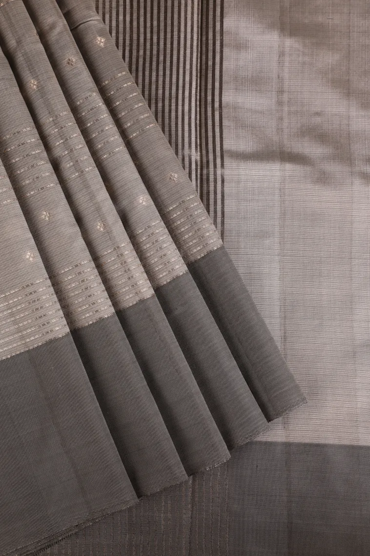 Gray Black Soft Silk Sarees with Gold Zari Straipes And Puttas