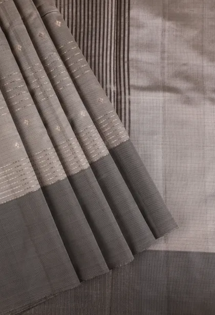 Gray Black Soft Silk Sarees with Gold Zari Straipes And Puttas