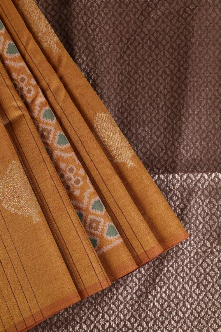 Honey Orange Tussar Saree with Gold Zari Straipes And Puttas
