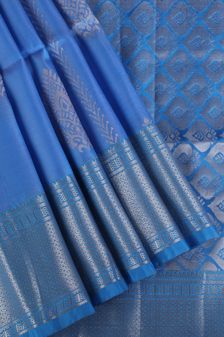 Cerulean Blue Soft Silk Saree with Gold Zari Straipes And Puttas