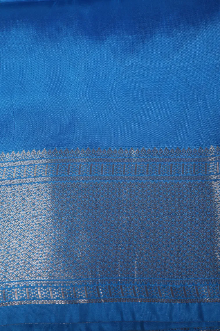 Cerulean Blue Soft Silk Saree with Gold Zari Straipes And Puttas view 3