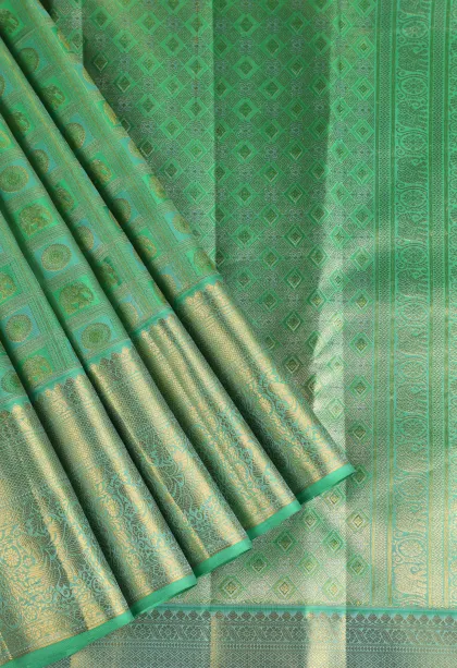 Forest Green Kanchipuram Silk Sarees with Gold Zari Animal Mottif