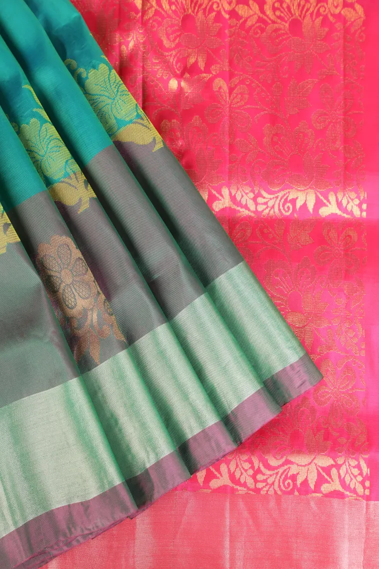 Teal Blue Soft Silk Saree with Gold Zari Flower Mottif