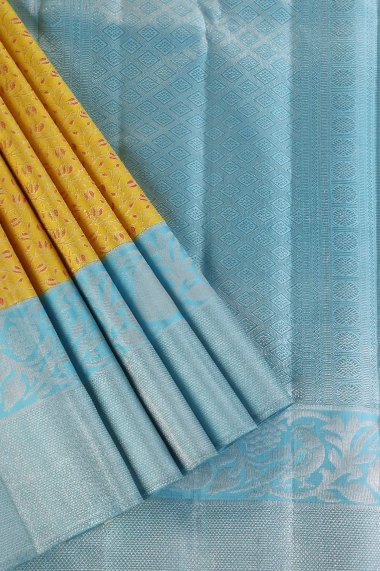 Lemon Yellow Kanchipuram Silk Sarees with Silver Zari Floral Patterns