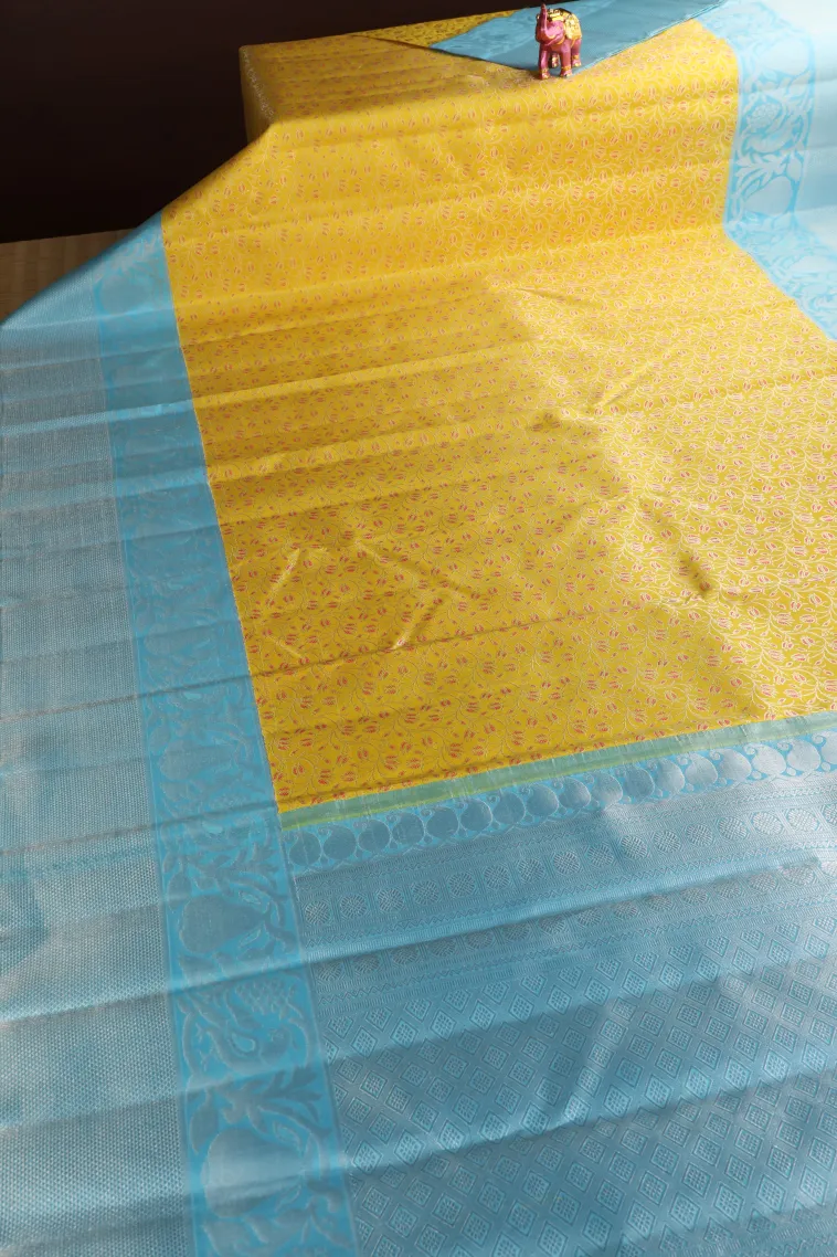 Lemon Yellow Kanchipuram Silk Sarees with Silver Zari Floral Patterns view 2
