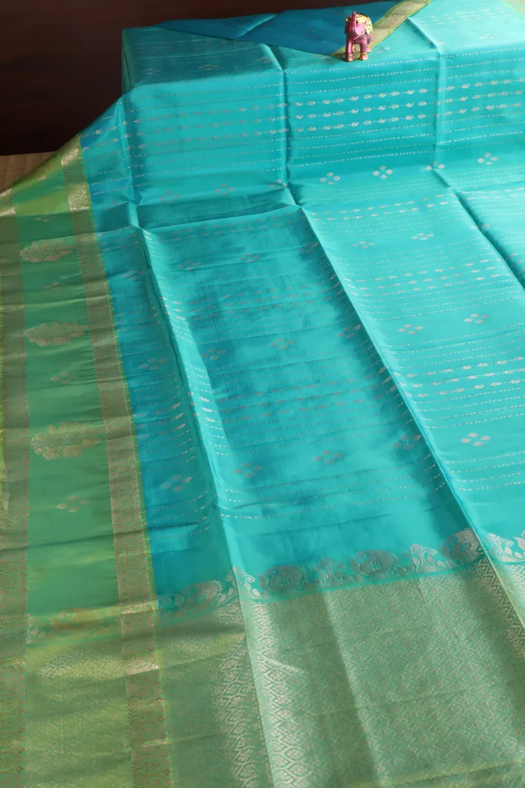 Sky Blue Soft Silk Saree with Gold Zari Straipes And Puttas view 2