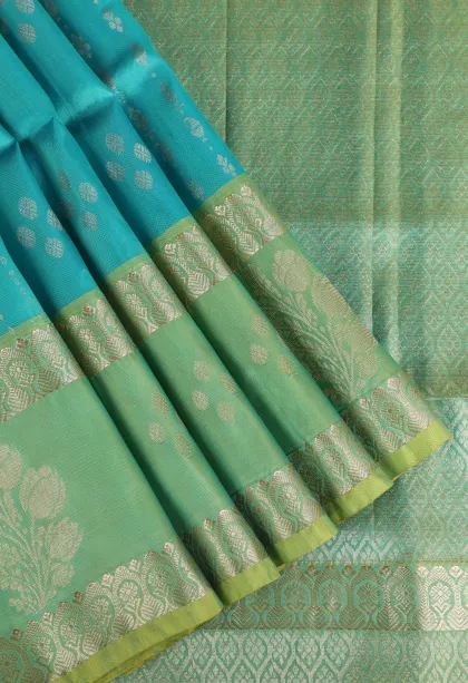 Sky Blue Soft Silk Saree with Gold Zari Straipes And Puttas