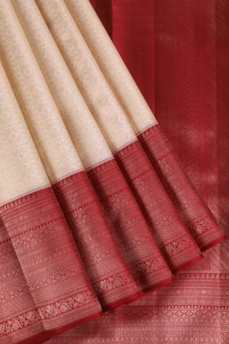 Chiffon White Kanchipuram Silk Sarees with Gold Zari Floral Patterns
