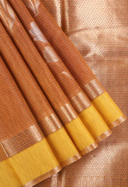 Tawny Brown Organza Saree with Gold And Silver Zari Straipes And Puttas