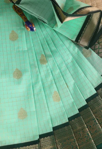 Seafoam Green Visiri Madippu Silk Sarees with Gold Zari Checks And Puttas