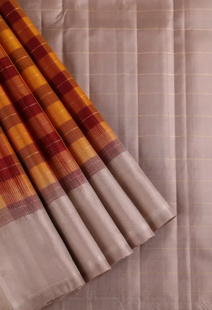 Honey Orange Soft Silk Saree with Silver Zari Checks