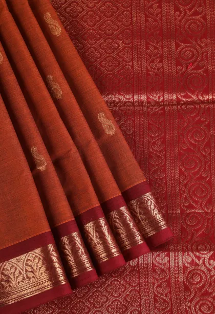Ginger Orange Pure Handloom Kovai Cotton with Gold Zari Peacock Motifs
