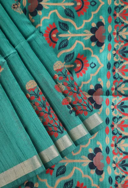 Teal Blue Semi Tussar Silk with Gold And Silver Zari Flower Mottif