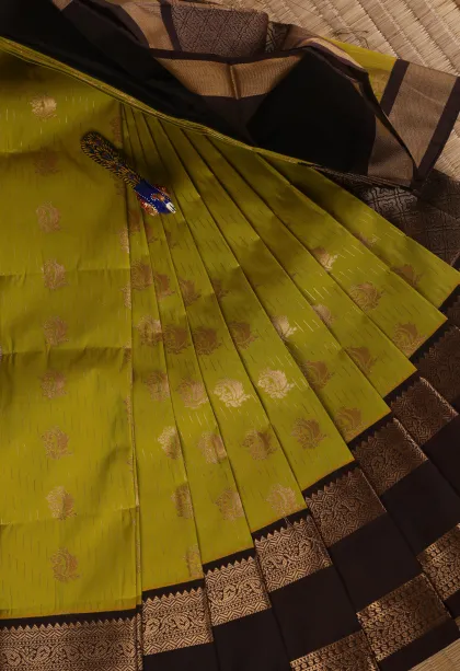 Olive Green Visiri Madippu Silk Sarees with Copper Zari Straipes And Puttas