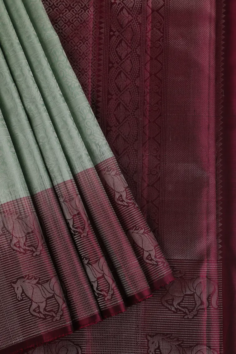 Pistachio Green Soft Silk Saree with Silver Zari Floral Patterns