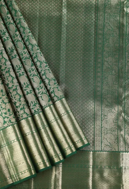Bottle Green Kanchipuram Silk Sarees with Gold And Silver Zari Animal And Bird Motifs