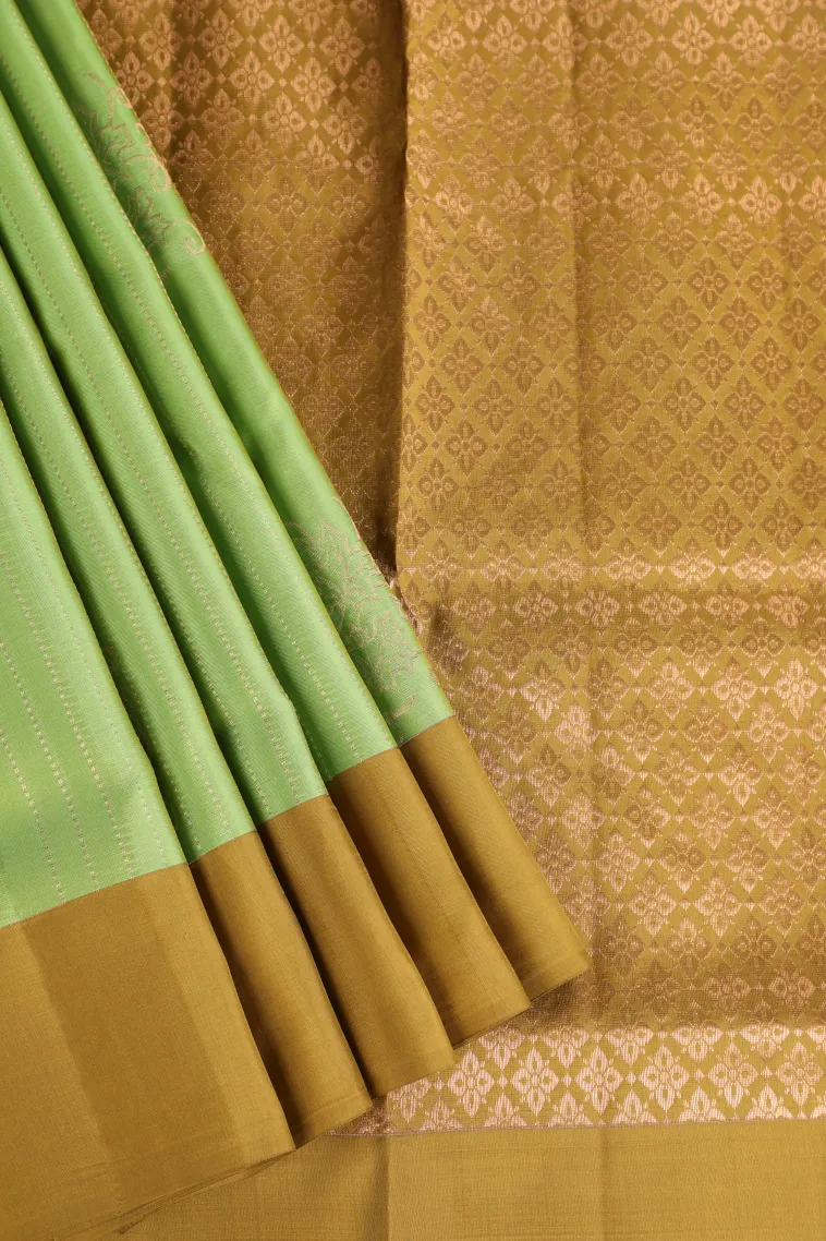 Lime Green Soft Silk Saree with Gold Zari Stripes And Puttas