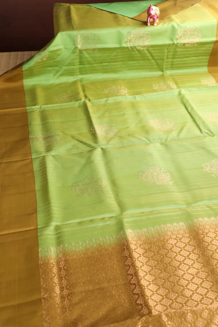 Lime Green Soft Silk Saree with Gold Zari Stripes And Puttas view 2