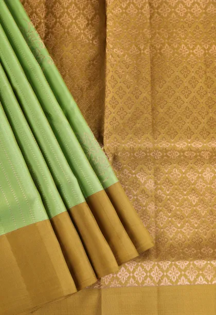 Lime Green Soft Silk Saree with Gold Zari Stripes And Puttas