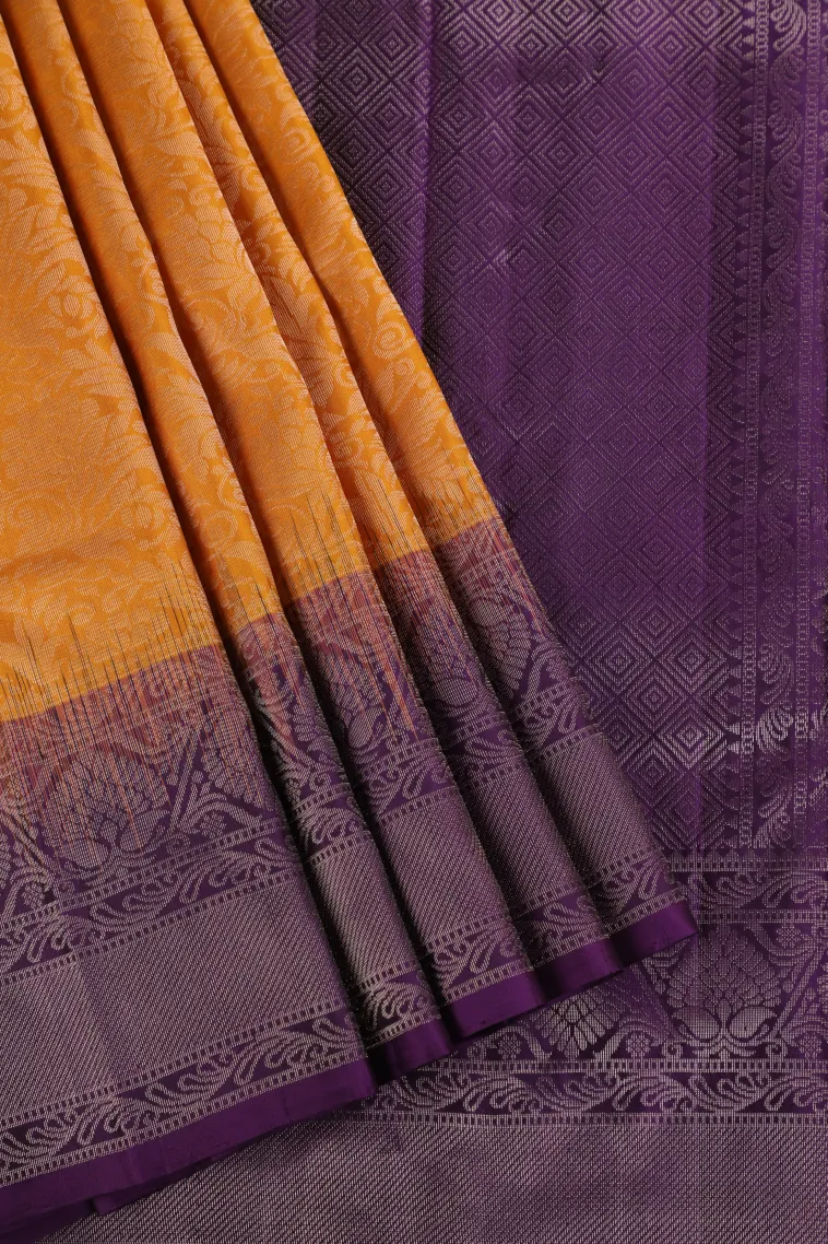 Honey Orange Soft Silk Saree with Silver Zari Floral Puttas