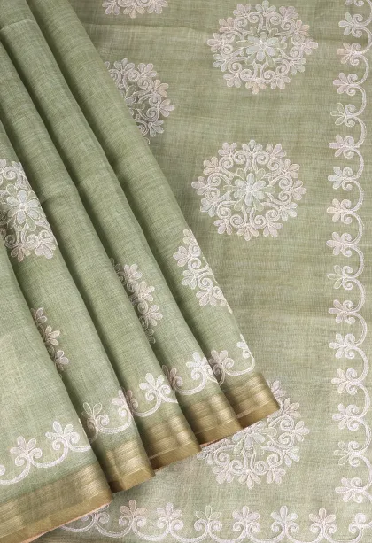 Pistachio Green Tissue Silk Sarees with Gold Zari Rangoli Pattren