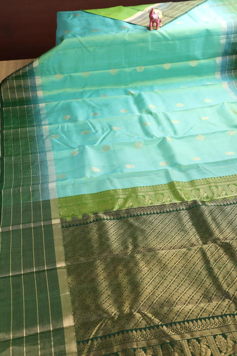 Sky Blue Soft Silk Saree with Gold Zari Stripes And Puttas view 2