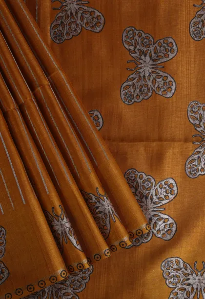 Ginger Orange Tussar Saree with Gold And Silver Zari Stripes