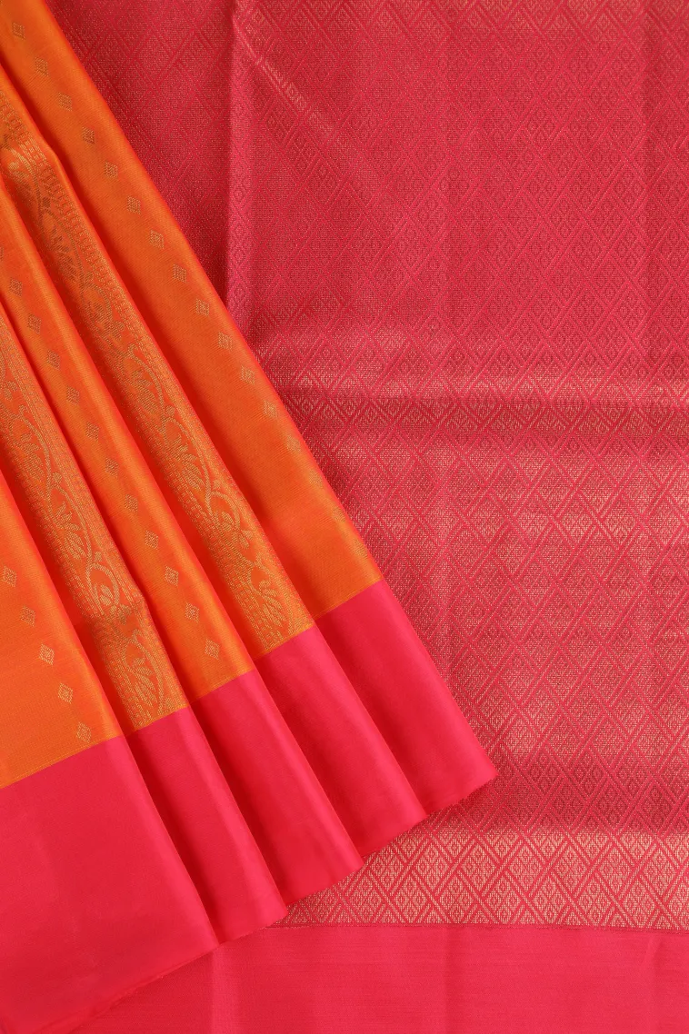 Carrot Orange Soft Silk Saree with Gold Zari Stripes And Puttas