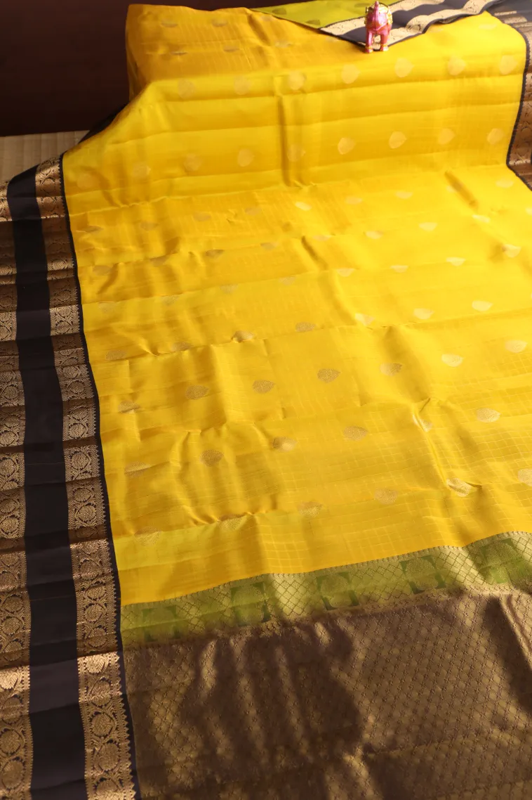 Lemon Yellow Soft Silk Saree with Gold Zari Checks And Puttas view 2