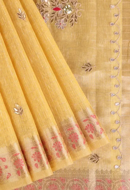 Lemon Yellow Tissue Silk Sarees with Gold Zari Leaf Puttas