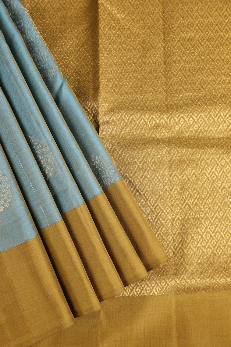 Stone Blue Soft Silk Saree with Gold Zari Stripes And Puttas