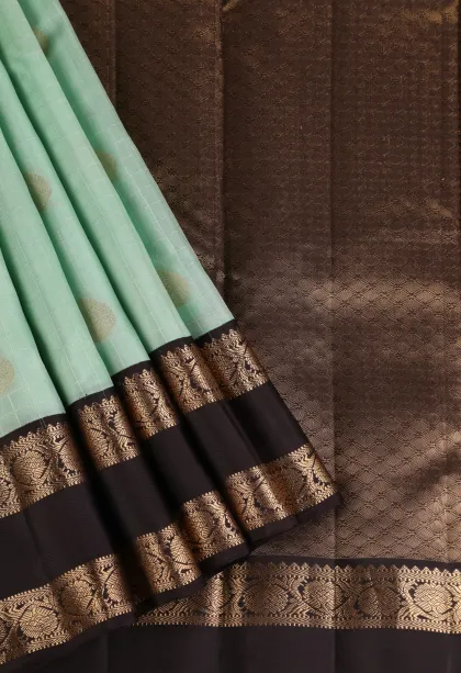 Mint Green Soft Silk Saree with Gold Zari Checks And Puttas
