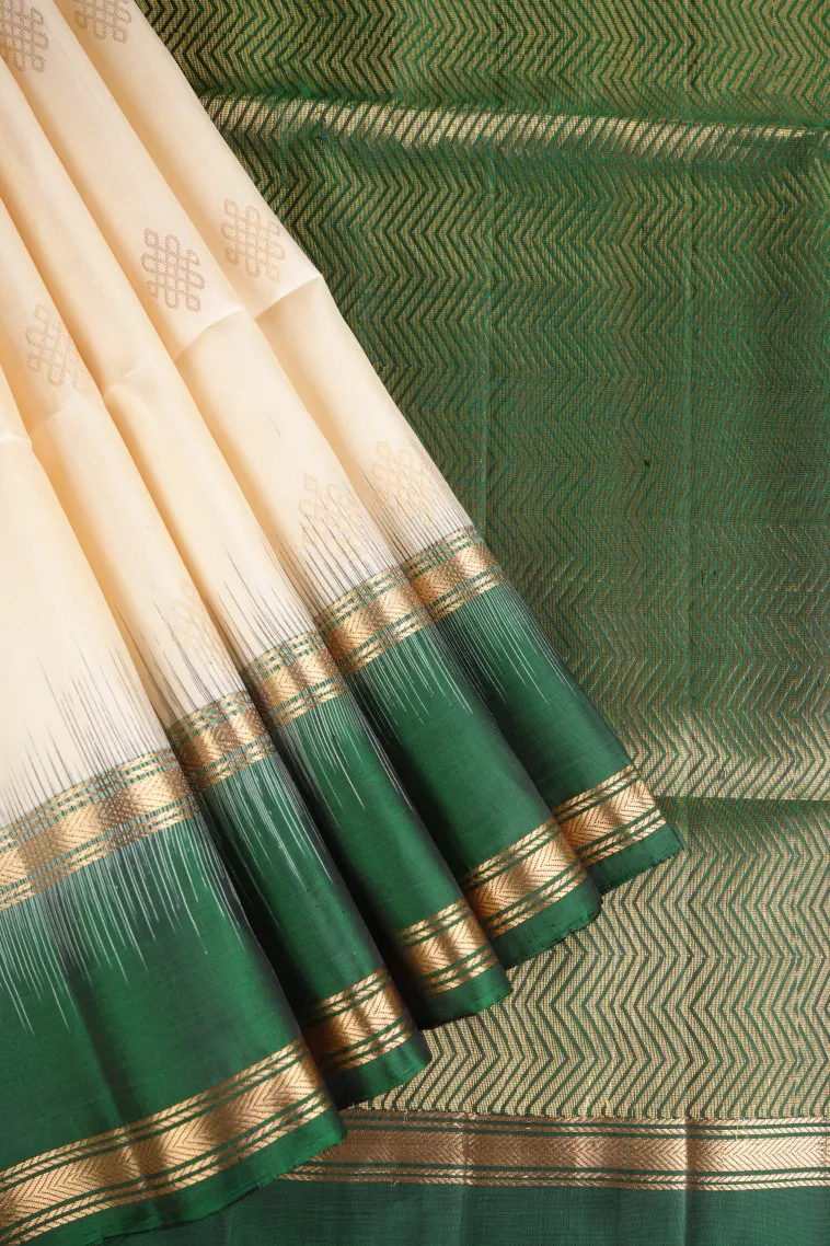 Cotton White Soft Silk Saree with Gold Zari Rangoli Pattren