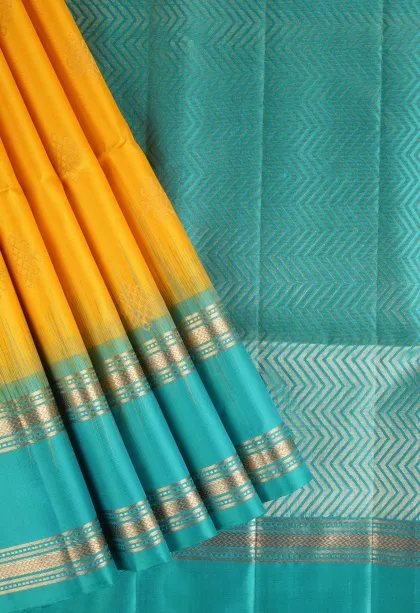 Lemon Yellow Soft Silk Saree with Gold Zari Rangoli Pattren