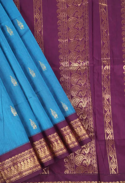Cerulean Blue Kalyani Cotton with Gold Zari Peacock Motifs